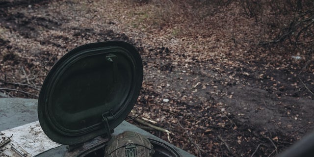 A Ukrainian tankman is seen in a tank on the Bakhmut frontline, Donetsk, Ukraine on November 27, 2022. 