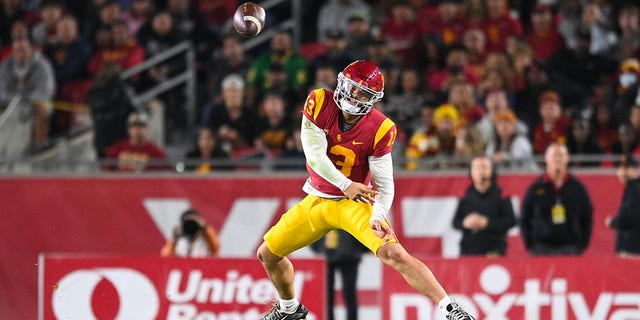 USC quarterback Caleb Williams throws the ball against Notre Dame, Nov. 26, 2022, at Los Angeles Memorial Coliseum in Los Angeles.