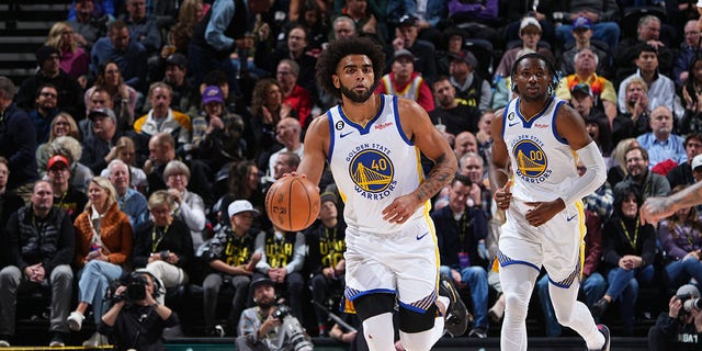 Anthony Lamb, #40 of the Golden State Warriors, dribbles the ball during the game against the Utah Jazz on Dec. 7, 2022 at Vivint SmartHome Arena in Salt Lake City.