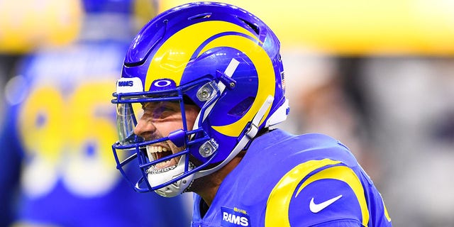 Los Angeles Rams quarterback Baker Mayfield (17) celebrates after throwing the game-winning touchdown pass during the NFL game between the Las Vegas Raiders and the Los Angeles Rams on December 8, 2022, at SoFi Stadium in Inglewood, CA. 