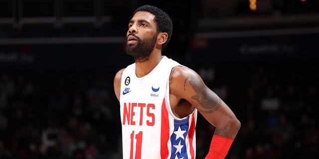 Kyrie Irving, #11 of the Brooklyn Nets, looks on during the game against the Washington Wizards on Dec. 12, 2022 at Capital One Arena in Washington, D.C.