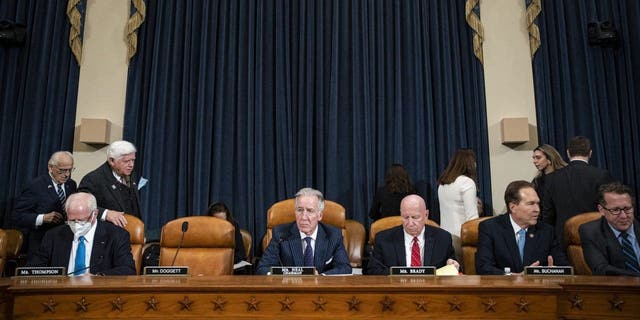 Rep. Richard Neal, chairman of the House Ways and Means Committee, center, and Rep. Kevin Brady, third from right, ranking member of the committee, during a business meeting in Washington, D.C., on Tuesday.