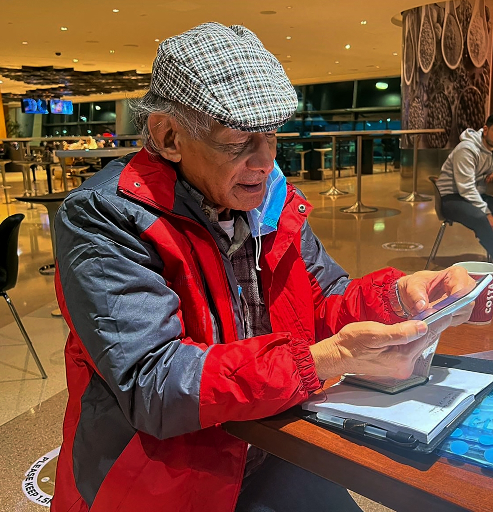 Sobhraj in the Doha airport waiting for his flight to France. 