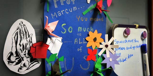 Mementos and notes of affection and loss are posted on the office door of American University Business Professor Sue Ann Marcum, who was killed during an apparent home invasion in her Bethesda, Maryland home on Oct. 26, 2010.