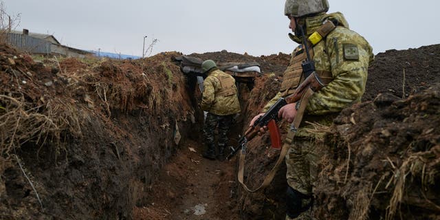 BAKHMUT, UKRAINE - DECEMBER 26: A unit of Border Guards on the frontline in trenches on December 26, 2022 in Bakhmut, Ukraine. A large swath of Donetsk region has been held by Russian-backed separatists since 2014. 