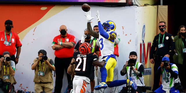 Odell Beckham Jr. #3 of the Los Angeles Rams makes a catch over Mike Hilton #21 of the Cincinnati Bengals for a touchdown in the first quarter during Super Bowl LVI at SoFi Stadium on Feb. 13, 2022 in Inglewood, Calif. 