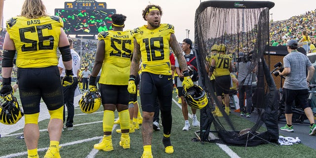 Cam McCormick, #18 of the Oregon Ducks, stands on the sidelines against the Eastern Washington Eagles at Autzen Stadium on September 10, 2022, in Eugene, Oregon.