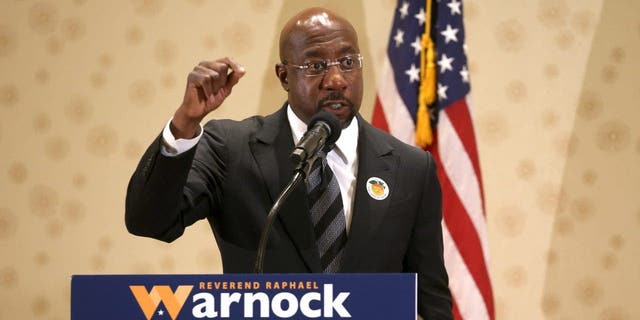 Georgia Democratic U.S. Senate candidate Sen. Raphael Warnock speaks during a campaign rally on Nov. 27, 2022, in Morrow, Georgia.