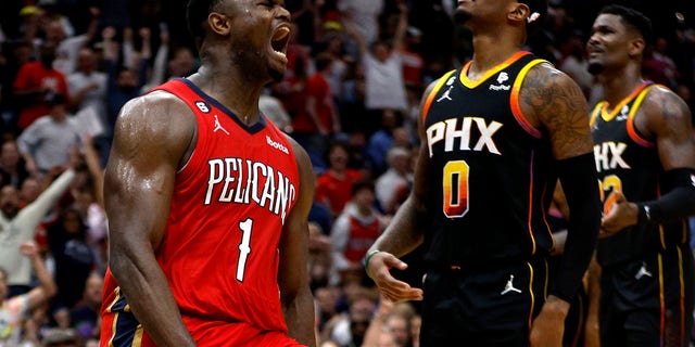 Zion Williamson, #1 of the New Orleans Pelicans, reacts after dunking the ball during the fourth quarter of an NBA game S at Smoothie King Center on December 9, 2022, in New Orleans, Louisiana. 