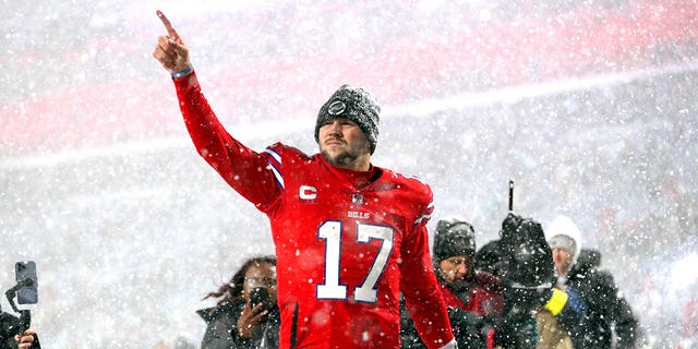 Josh Allen, #17 of the Buffalo Bills, runs off the field after a game against the Miami Dolphins at Highmark Stadium on Dec. 17, 2022 in Orchard Park, New York. 