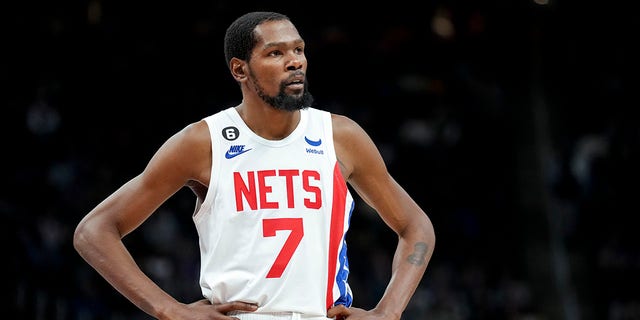 Kevin Durant of the Brooklyn Nets looks on against the Detroit Pistons at Little Caesars Arena on Dec. 18, 2022, in Detroit.