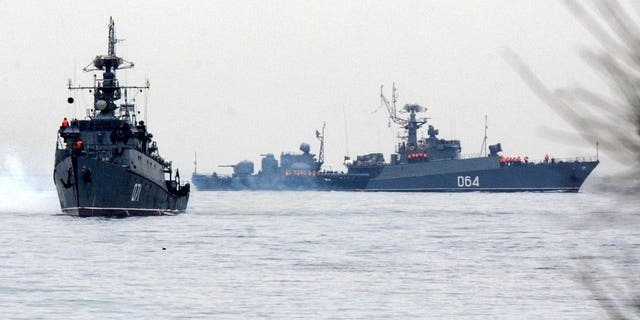 Russian Navy ships are docked in the Sevastopol bay on March 4, 2014. Russian forces have surrounded Ukrainian military bases across Crimea as the Russian-speaking autonomous region has been thrown into turmoil following the ouster last month of Moscow-backed president Viktor Yanukovych. 