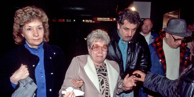 Families of victims of Pan Am 103 which crashed in Lockerbie, Scotland, due to a terrorist bomb, arrive at JFK Airport, New York, New York, December 21, 1988. 