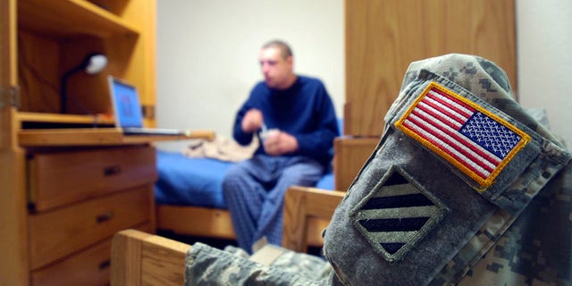 An Army corporal in his quarters, May 1, 2008, in Fort Stewart, Georgia.