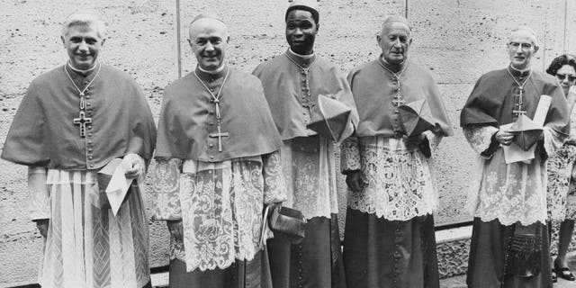 Five new cardinals created by the Pope at the Vatican, 27th June 1977. From left to right, they are Cardinal Joseph Ratzinger of Germany (later Pope Benedict XVI), Cardinal Giovanni Benelli, the former Vatican Under-Secretary of State, Cardinal Bernardin Gantin of Benin, Cardinal Frantisek Tomasek of Prague, and Cardinal Mario Luigi Ciappi, a Vatican theologian. 