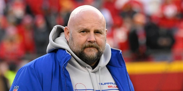 Buffalo Bills offensive coordinator Brian Daboll attends warmups before an NFL divisional playoff game against the Kansas City Chiefs Jan. 23, 2022, in Kansas City, Mo.