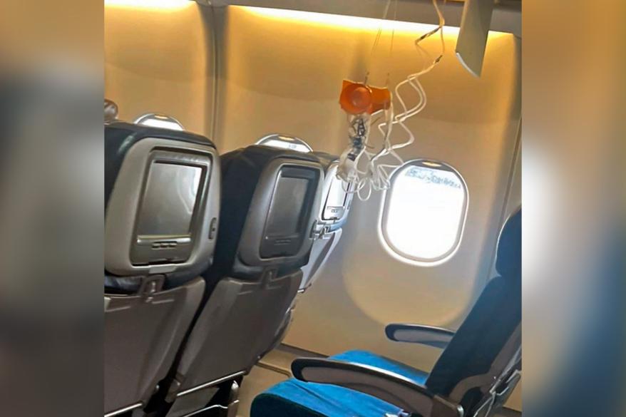 interior of a Hawaiian Airlines plane on its flight from Phoenix to Honolulu, Sunday, Dec. 18, 2022