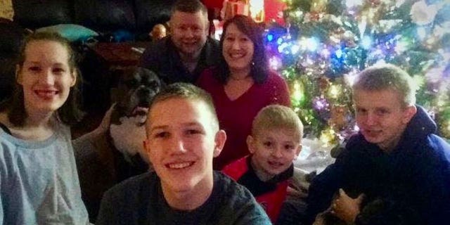 Ken DeLand, an American college student missing in France, is seen in family Christmas photo. 