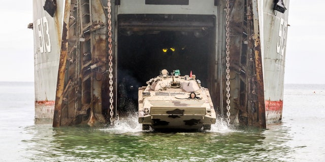 Iranian soldiers take part in an annual military drill in the coast of the Gulf of Oman and near the strategic Strait of Hormuz, in Jask, Iran on Dec. 30, 2022.