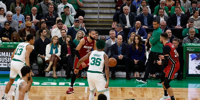 Prince William and Kate Middleton watch the game between the Boston Celtics and Miami Heat at TD Garden on Nov. 30, 2022, in Boston.