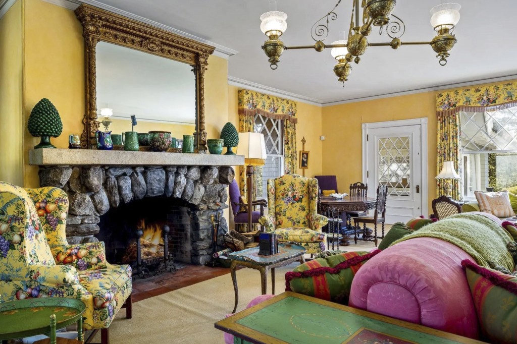 With flower-patterned wallpaper and eclectic plush sofas, the mansion looks more like what you'd expect from your great aunt than from the great John Travolta.
