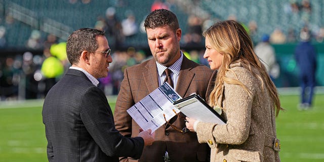 Fox Sports sideline reporter Erin Andrews interviews Philadelphia Eagles General Manger Howie Roseman and Tennessee Titans General Manger Jon Robinson during the game between the Tennessee Titans and the Philadelphia Eagles on Dec. 4, 2022 at Lincoln Financial Field in Philadelphia.