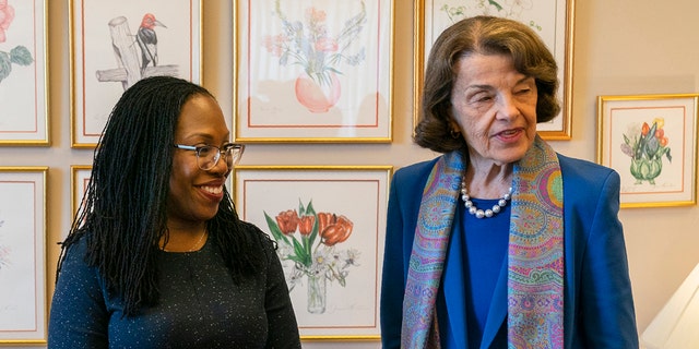 Sen. Dianne Feinstein, D-Calif., right, greets Supreme Court nominee Judge Ketanji Brown Jackson at the Capitol, March 16, 2022, in Washington.