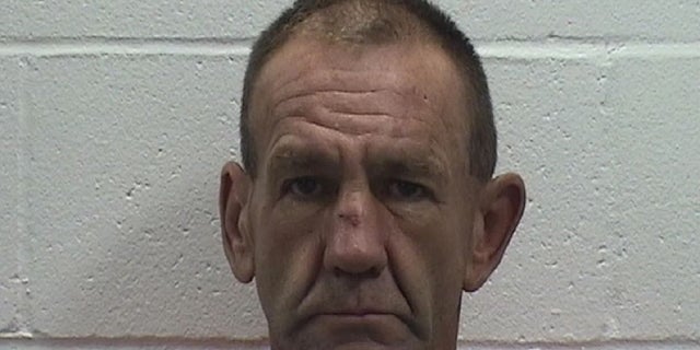 Larry Doil Sanders, 53, was charged with murder for allegedly killing another man while they were fishing.  