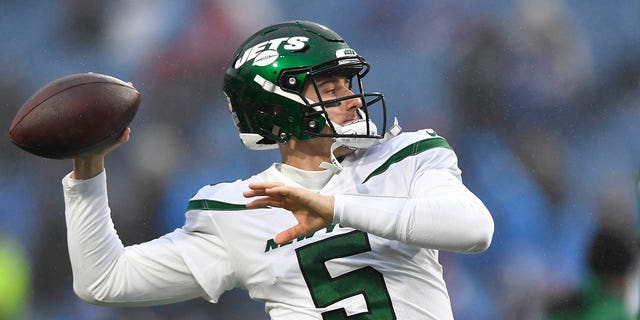 New York Jets quarterback Mike White winds up to pass while warming up prior to an NFL football game against the Buffalo Bills, Sunday, Dec. 11, 2022, in Orchard Park, New York.