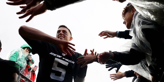 Mike White of the New York Jets celebrates after beating the Chicago Bears 31-10 at MetLife Stadium on Nov. 27, 2022, in East Rutherford, New Jersey.