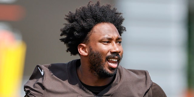 Cleveland Browns defensive end Myles Garrett runs during an NFL football practice Thursday, Aug. 12, 2021, in Berea, Ohio. (AP Photo/Ron Schwane)