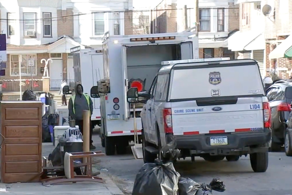 Police activity outside of a Philadelphia home where human remains were found.