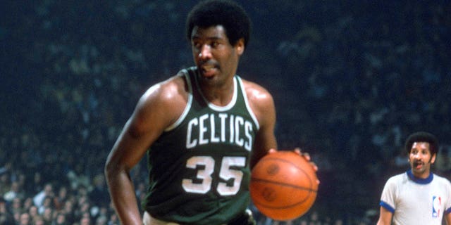 Paul Silas, #35 of the Boston Celtics, dribbles the ball against the Washington Bullets during an NBA basketball game circa 1975 at the Capital Centre in Landover, Maryland. Silas played for the Celtics from 1972 to 1976.