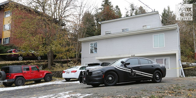 Law enforcement vehicles on the scene of the Idaho quadruple murder.