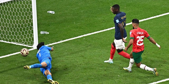 Forward Randal Kolo Muani of France (12) scores his team's second goal during a Qatar 2022 World Cup semifinal match against Morocco at Al-Bayt Stadium in Al Khor, north of Doha, Dec. 14, 2022.