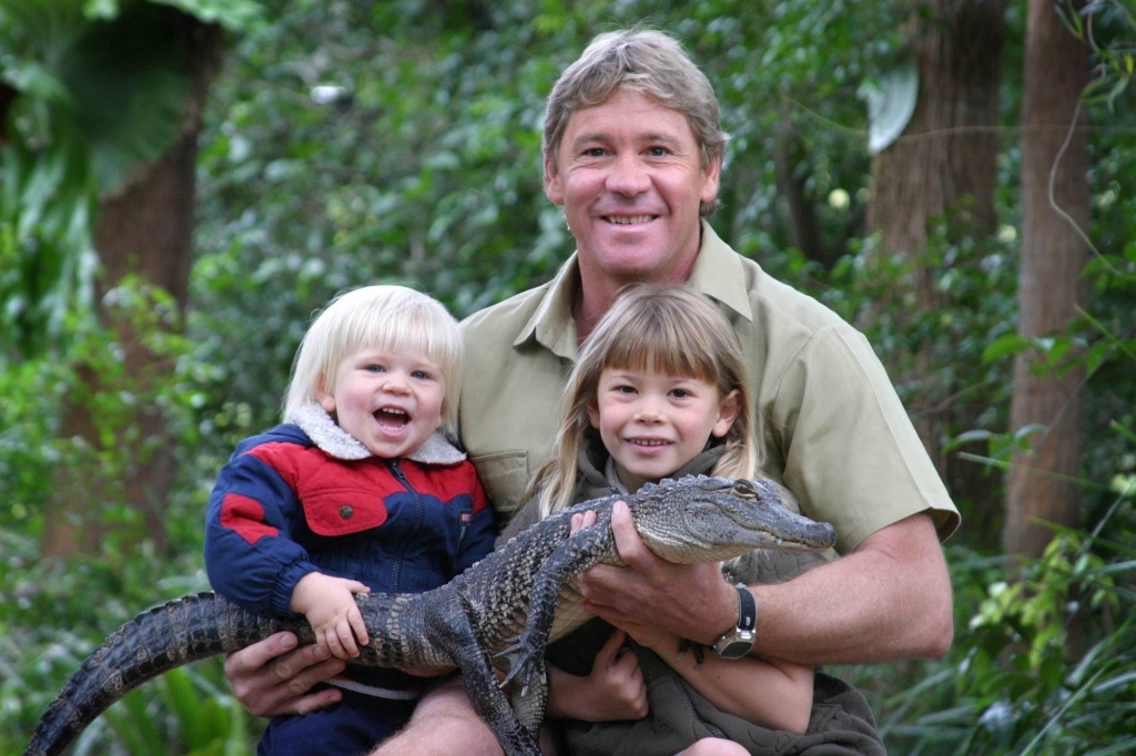 A young Robert Irwin with his older sister Bindi and their father Steve Irwin. 