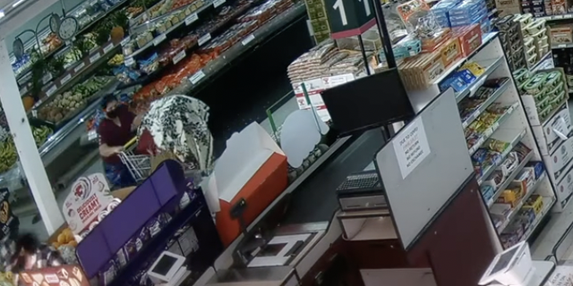 The women walked out of the store with the safe concealed in a grocery cart. 