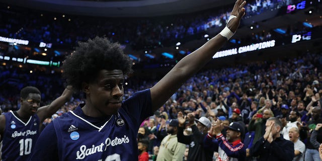 Clarence Rupert waves to the crowd after the St. Peter's Peacocks were defeated by the North Carolina Tar Heels 69-49 in the Elite Eight round game of the NCAA tournament at Wells Fargo Center on March 27, 2022, in Philadelphia.