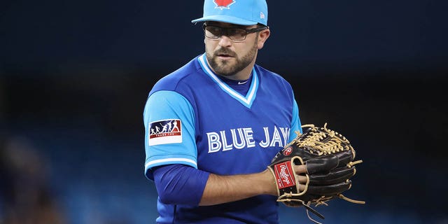 TJ House, #44 of the Toronto Blue Jays, looks in before delivering a pitch in the ninth inning during MLB game action against the Minnesota Twins at Rogers Centre on Aug. 25, 2017 in Toronto.