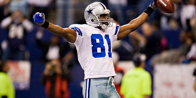 Terrell Owens #81 of the Dallas Cowboys celebrates after scoring a touchdown against the Seattle Seahawks at Texas Stadium November 27, 2008 in Irving, Texas.  The Cowboys defeated the Seahawks 34-9.