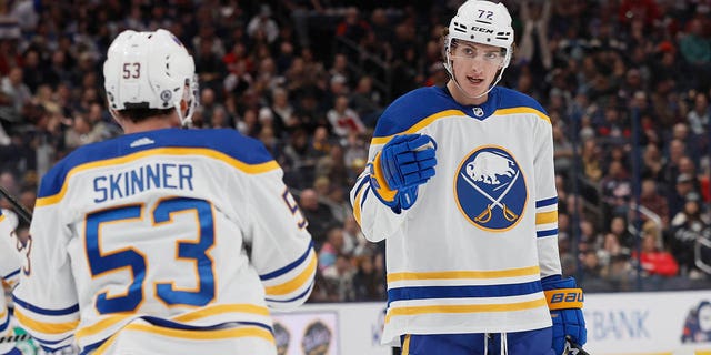 Buffalo Sabres' Tage Thompson, right, celebrates his goal against the Columbus Blue Jackets with Jeff Skinner during the first period of an NHL hockey game Wednesday, Dec. 7, 2022, in Columbus, Ohio. 