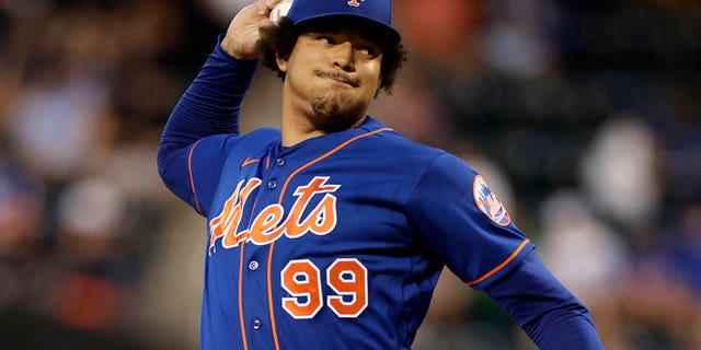 New York Mets pitcher Taijuan Walker throws during the first inning of the team's baseball game against the Los Angeles Dodgers on Aug. 30, 2022, in New York.