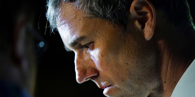 Texas Democratic gubernatorial candidate and former U.S. congressman Beto O'Rourke listens to his staff during his campaign kickoff event in McAllen, Texas, Nov. 17, 2021.