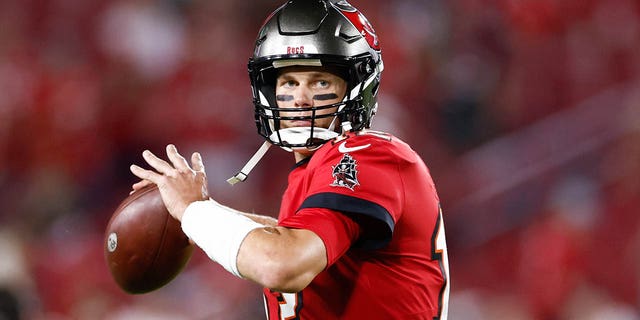 Tampa Bay Buccaneers quarterback Tom Brady, #12, warms up prior to the game against the New Orleans Saints at Raymond James Stadium in Tampa, Florida, Dec. 5, 2022.