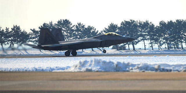 A U.S. F-22 fighter jet lands during the joint air drills with South Korea in Gunsan, South Korea, Tuesday, Dec. 20, 2022.