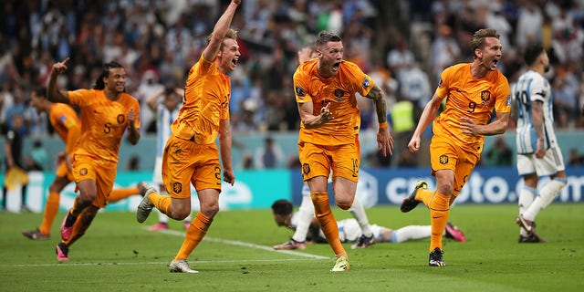 Wout Weghorst of the Netherlands celebrates after scoring his team's second goal during a FIFA World Cup Qatar 2022 quarterfinal match against Argentina at Lusail Stadium Dec. 9, 2022, in Lusail City, Qatar.