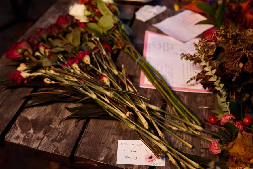 A memorial outside Mad Greek restaurant