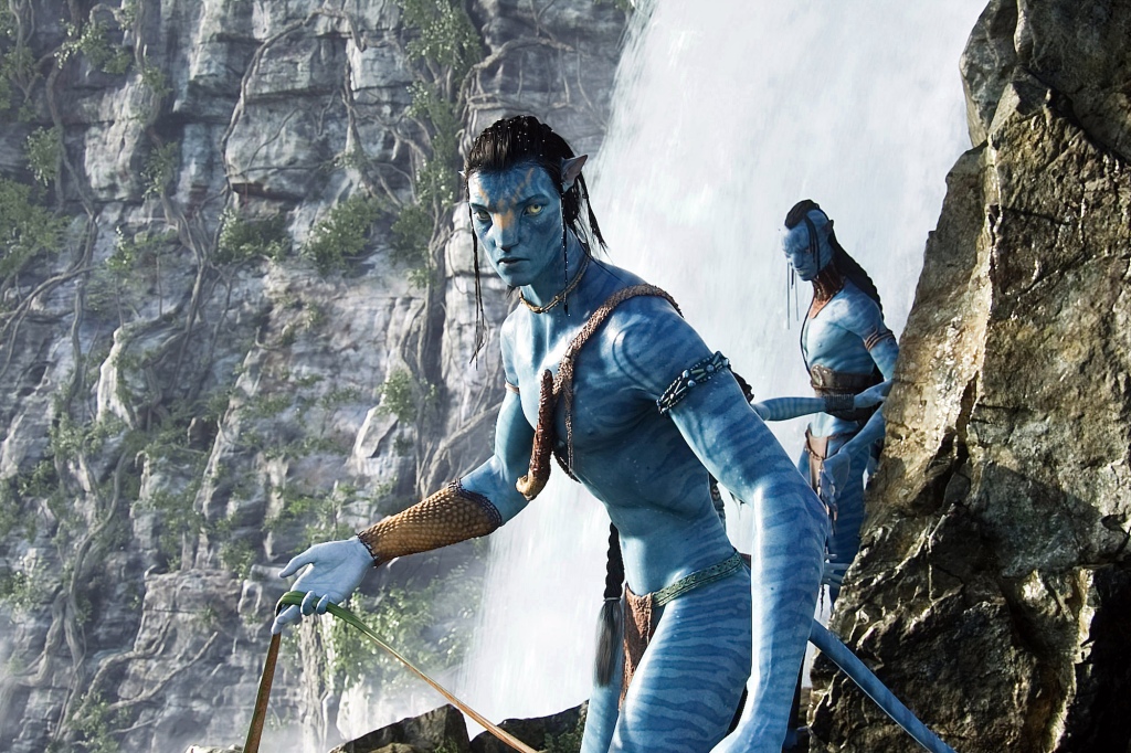 Sam Worthington and Laz Alonso in "Avatar" as blue creatures next to a waterfall. 