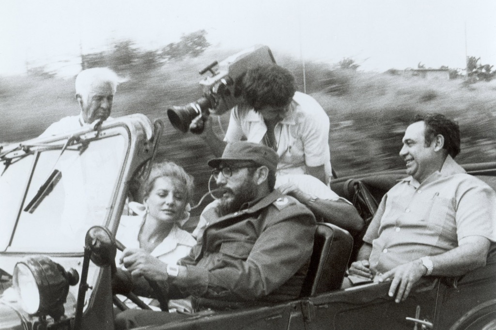 Walters, Fidel Castro with cameraman in car