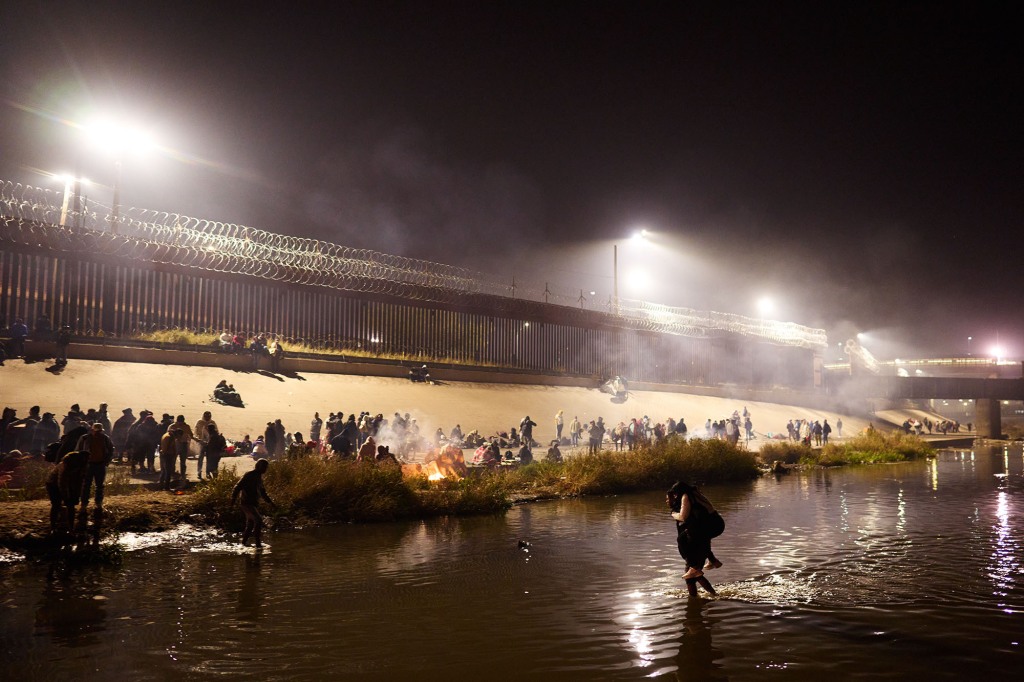 Migrants cross the U.S.-Mexico Border at the Rio Grande River from Ciudad Juarez, Mexico.